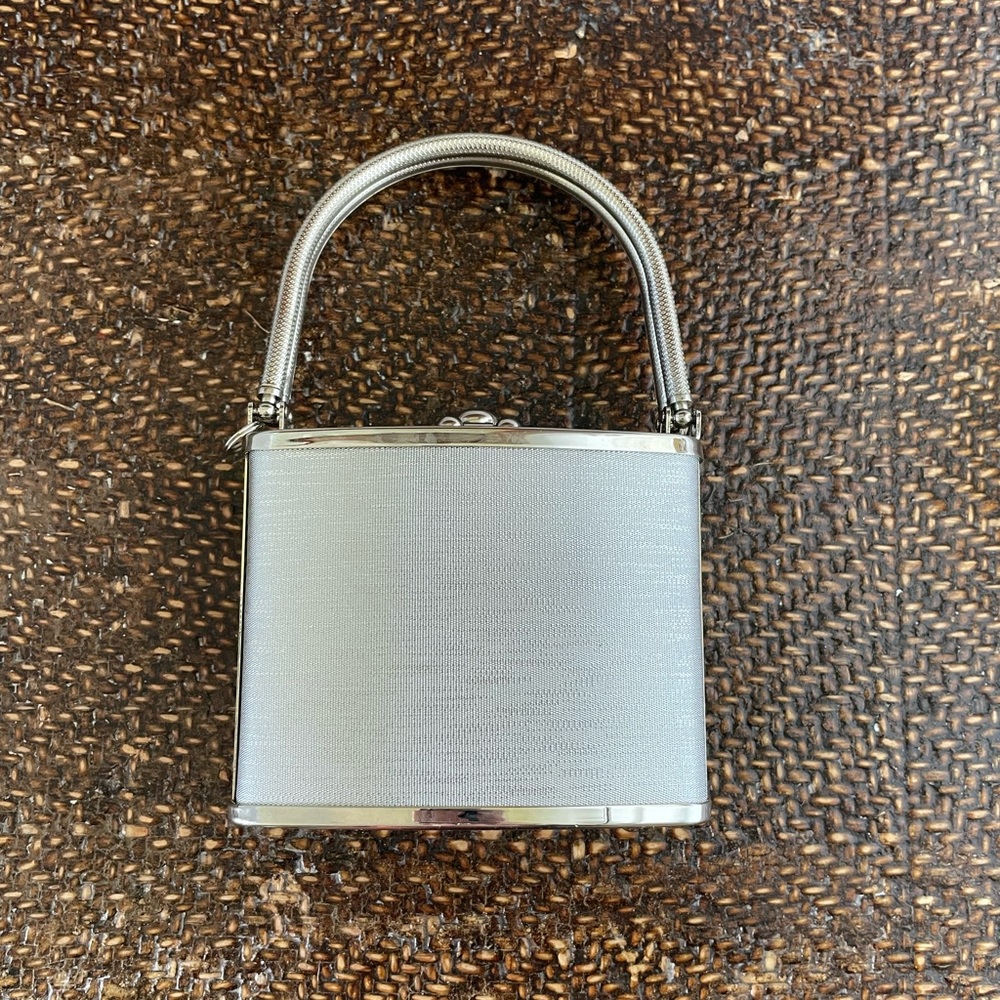 Metallic silver evening clutch with chain